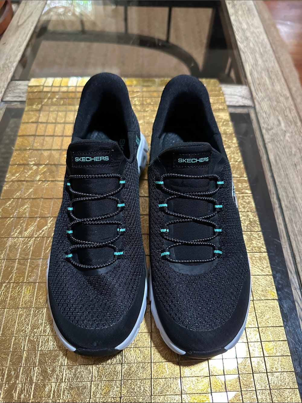 Skechers Women's Black Slip-On Athletic Sneakers with Teal Accents